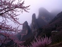 photograph, Hopeless, landscape of a Highmountain from inside of a cherry blossom pink Monoliths, it is very Health Goth Art and Misshapen