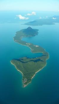 aquamarine theme, A serene aerial view of Isla de Ometepe, Nicaragua, showcasing its stunning hourglass shape formed by two volcanoes