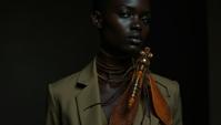 by David Sims, Fashion photography of a Kenyan Damselfly , Dorky, it is dressed in fashion outfit