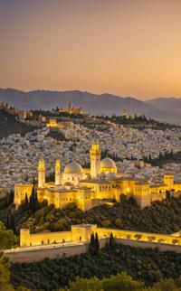 Photograph of an elegant white and lemon yellow Alhambra, with a clean, modern corporate environment in the background The camera captures the smooth, direct flash effect with precision