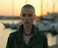 by Pedro Almodovar , photograph, stylized, low angle shot of a Conscious Armored slender Urban Alice Eve